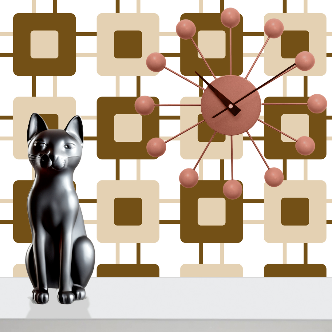 The artwork features a repeating geometric pattern of symmetrical shapes resembling elongated, curved diamonds or petals in various shades of blue and green. Each shape is split vertically with one half filled with a light blue and the other half filled with green or darker blue. The background is a light, almost pastel blue, which provides a soft yet vibrant backdrop. One of the blue shapes near the upper left contains a white starburst element, adding a focal point of brightness to the composition. The overall design conveys a modern, mid-century aesthetic with clean lines and harmonious color contrasts.